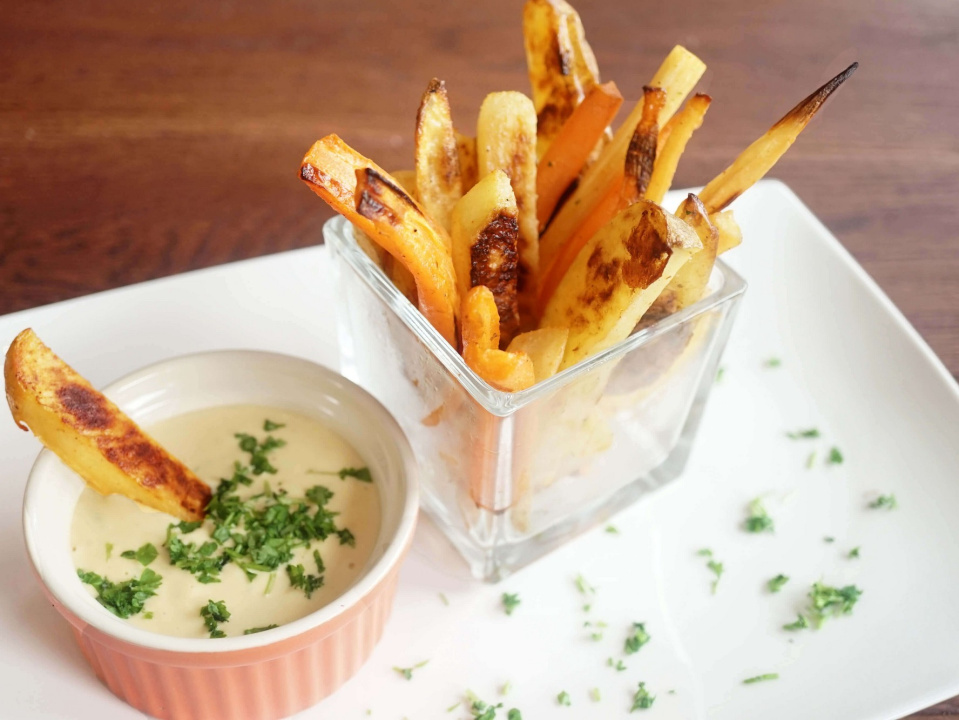 Baked vegetables with chives and chia oil sauce